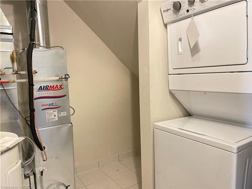 107-1565 Rose Way, Milton, ON - Indoor Photo Showing Laundry Room