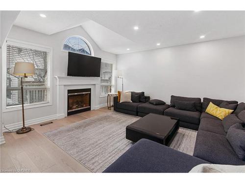 608 Brothers Crescent, Milton, ON - Indoor Photo Showing Living Room With Fireplace