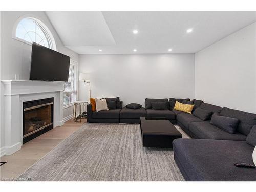 608 Brothers Crescent, Milton, ON - Indoor Photo Showing Living Room With Fireplace