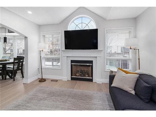 608 Brothers Crescent, Milton, ON - Indoor Photo Showing Living Room With Fireplace