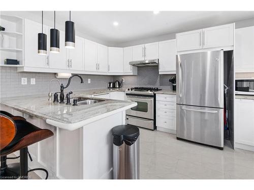 608 Brothers Crescent, Milton, ON - Indoor Photo Showing Kitchen With Double Sink With Upgraded Kitchen