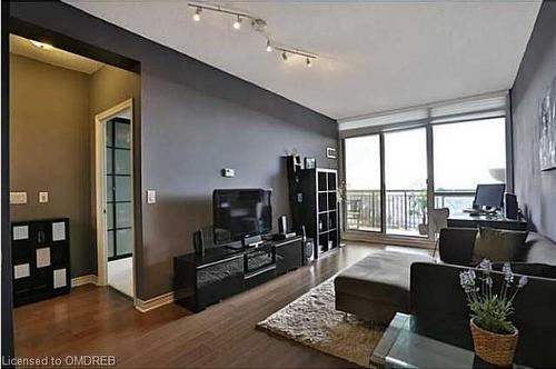 1101-2391 Central Park Drive, Oakville, ON - Indoor Photo Showing Living Room