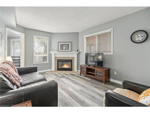 78 Lauchlin Crescent, Georgetown, ON - Indoor Photo Showing Living Room With Fireplace