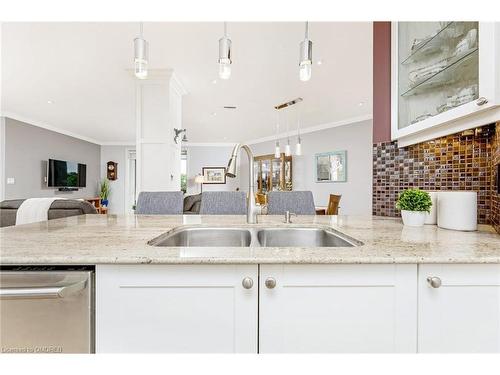 301-33 Whitmer Street, Milton, ON - Indoor Photo Showing Kitchen With Double Sink With Upgraded Kitchen