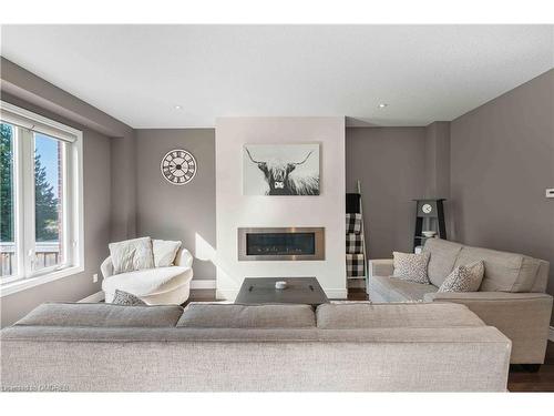 21 Melody Lane Lane, Grand Valley, ON - Indoor Photo Showing Living Room With Fireplace