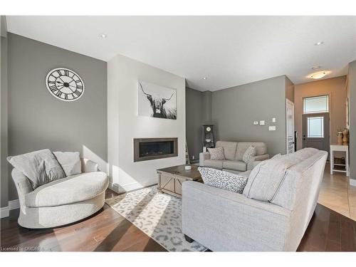 21 Melody Lane Lane, Grand Valley, ON - Indoor Photo Showing Living Room With Fireplace