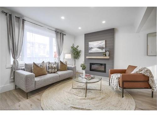 393 Weber Street E, Kitchener, ON - Indoor Photo Showing Living Room With Fireplace