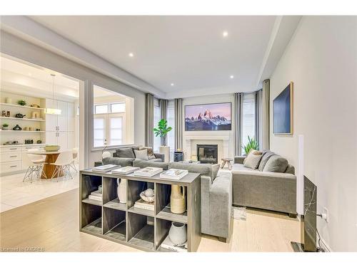 83 Ballmer Trail, Oakville, ON - Indoor Photo Showing Living Room With Fireplace