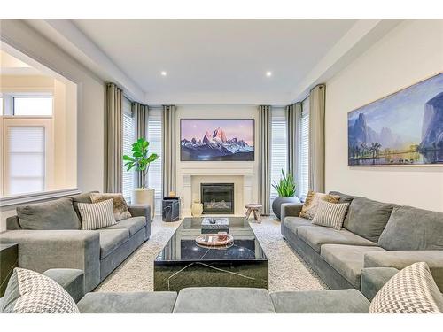 83 Ballmer Trail, Oakville, ON - Indoor Photo Showing Living Room With Fireplace