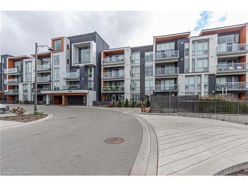 304-3028 Creekshore Common, Oakville, ON - Outdoor With Balcony With Facade