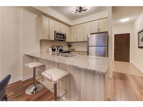 226-216 Oak Park Boulevard, Oakville, ON - Indoor Photo Showing Kitchen With Stainless Steel Kitchen With Double Sink