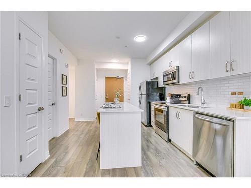 223-1105 Leger Way, Milton, ON - Indoor Photo Showing Kitchen With Stainless Steel Kitchen