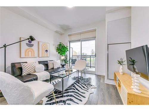 223-1105 Leger Way, Milton, ON - Indoor Photo Showing Living Room