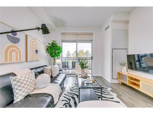 223-1105 Leger Way, Milton, ON - Indoor Photo Showing Living Room