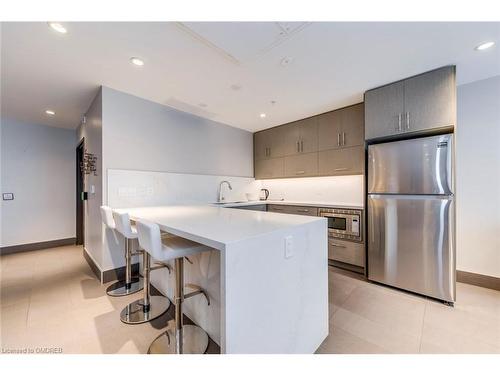 223-1105 Leger Way, Milton, ON - Indoor Photo Showing Kitchen With Stainless Steel Kitchen