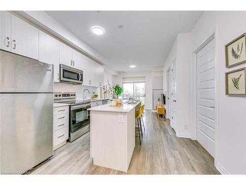 223-1105 Leger Way, Milton, ON - Indoor Photo Showing Kitchen With Stainless Steel Kitchen