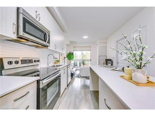 223-1105 Leger Way, Milton, ON - Indoor Photo Showing Kitchen With Stainless Steel Kitchen