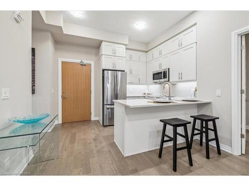 629-128 Grovewood Common, Oakville, ON - Indoor Photo Showing Kitchen With Stainless Steel Kitchen With Upgraded Kitchen