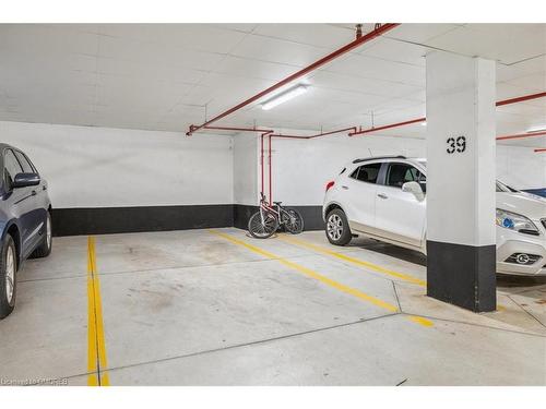 629-128 Grovewood Common, Oakville, ON - Indoor Photo Showing Garage