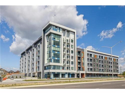 115-95 Dundas Street W, Oakville, ON - Outdoor With Balcony With Facade