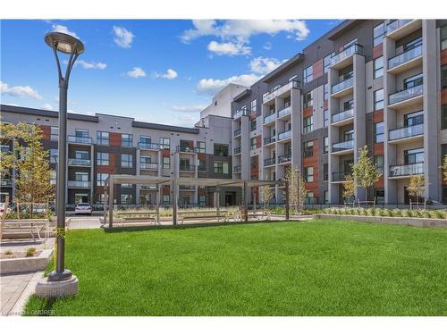 115-95 Dundas Street W, Oakville, ON - Outdoor With Balcony With Facade