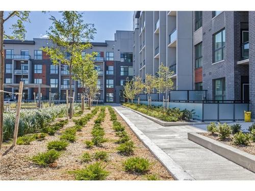 115-95 Dundas Street W, Oakville, ON - Outdoor With Balcony With Facade