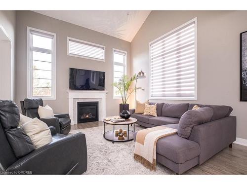 1456 Ford Strathy Crescent, Oakville, ON - Indoor Photo Showing Living Room With Fireplace