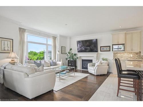 2447 Chateau Common, Oakville, ON - Indoor Photo Showing Living Room With Fireplace