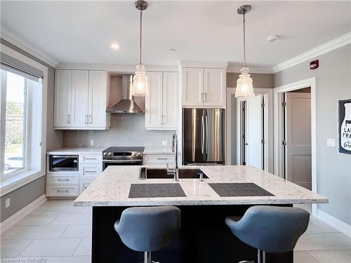 210-257 Millen Road, Stoney Creek, ON - Indoor Photo Showing Kitchen With Stainless Steel Kitchen With Upgraded Kitchen