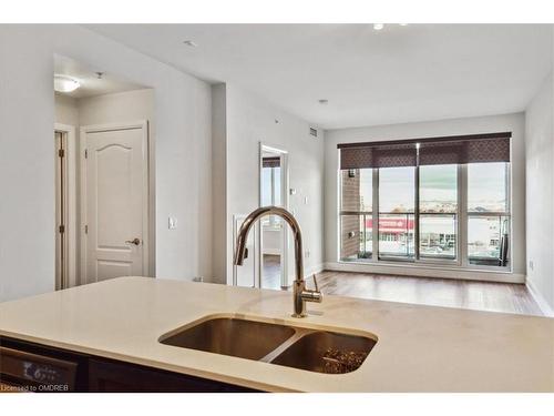 523-2480 Prince Michael Drive, Oakville, ON - Indoor Photo Showing Kitchen With Double Sink