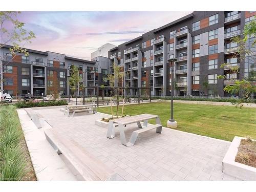 418-95 Dundas Street W, Oakville, ON - Outdoor With Balcony With Facade