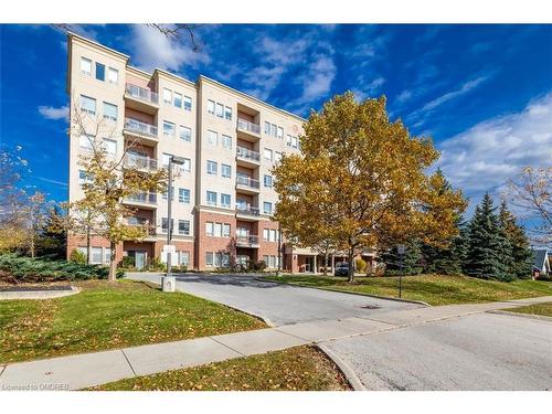 403-1499 Nottinghill Gate, Oakville, ON - Outdoor With Facade