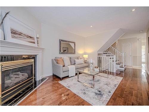 7-2105 Berwick Drive, Burlington, ON - Indoor Photo Showing Living Room With Fireplace