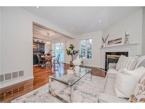 7-2105 Berwick Drive, Burlington, ON - Indoor Photo Showing Living Room With Fireplace