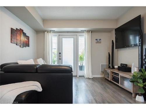 111-1045 Nadalin Heights, Milton, ON - Indoor Photo Showing Living Room