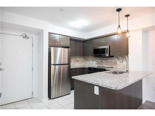 111-1045 Nadalin Heights, Milton, ON - Indoor Photo Showing Kitchen With Double Sink With Upgraded Kitchen