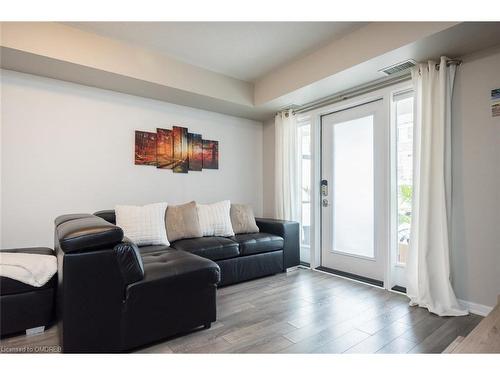 111-1045 Nadalin Heights, Milton, ON - Indoor Photo Showing Living Room