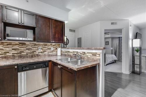 208-1340 Main Street E, Milton, ON - Indoor Photo Showing Kitchen With Double Sink