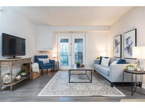 208-1340 Main Street E, Milton, ON - Indoor Photo Showing Living Room