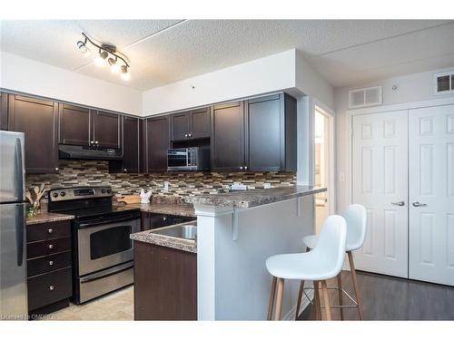 208-1340 Main Street E, Milton, ON - Indoor Photo Showing Kitchen With Upgraded Kitchen