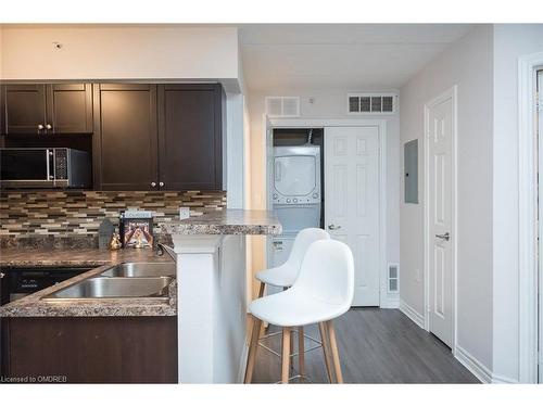 208-1340 Main Street E, Milton, ON - Indoor Photo Showing Kitchen With Double Sink