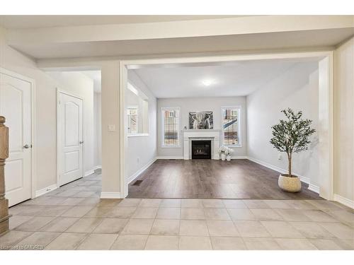 4-4021 Phoenix Way, Oakville, ON - Indoor Photo Showing Living Room With Fireplace