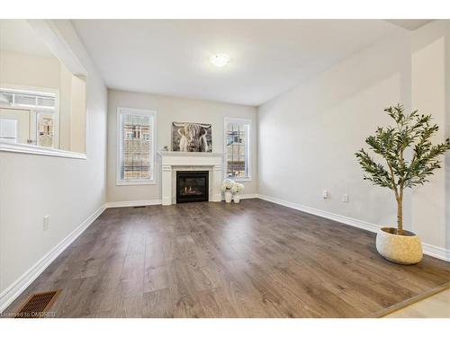 4-4021 Phoenix Way, Oakville, ON - Indoor Photo Showing Living Room With Fireplace