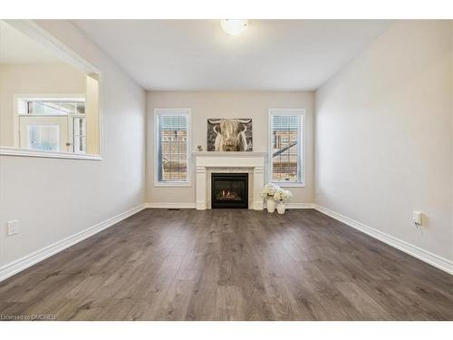 4-4021 Phoenix Way, Oakville, ON - Indoor Photo Showing Living Room With Fireplace