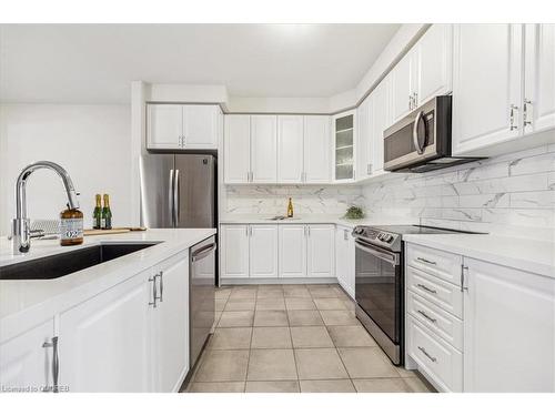 4-4021 Phoenix Way, Oakville, ON - Indoor Photo Showing Kitchen With Stainless Steel Kitchen With Upgraded Kitchen