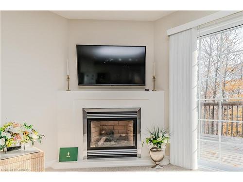 6 Knotty Pine Trail, Huntsville, ON - Indoor Photo Showing Living Room With Fireplace