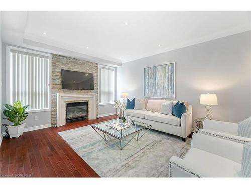 1026 Laidlaw Drive, Milton, ON - Indoor Photo Showing Living Room With Fireplace