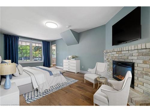 483 Caesar Avenue, Oakville, ON - Indoor Photo Showing Bedroom With Fireplace