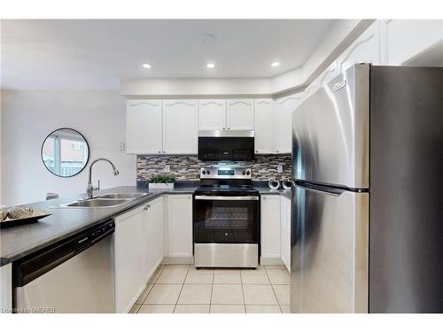 1534 Evans Terrace, Milton, ON - Indoor Photo Showing Kitchen With Double Sink