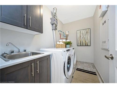 119-830 Megson Terrace, Milton, ON - Indoor Photo Showing Laundry Room